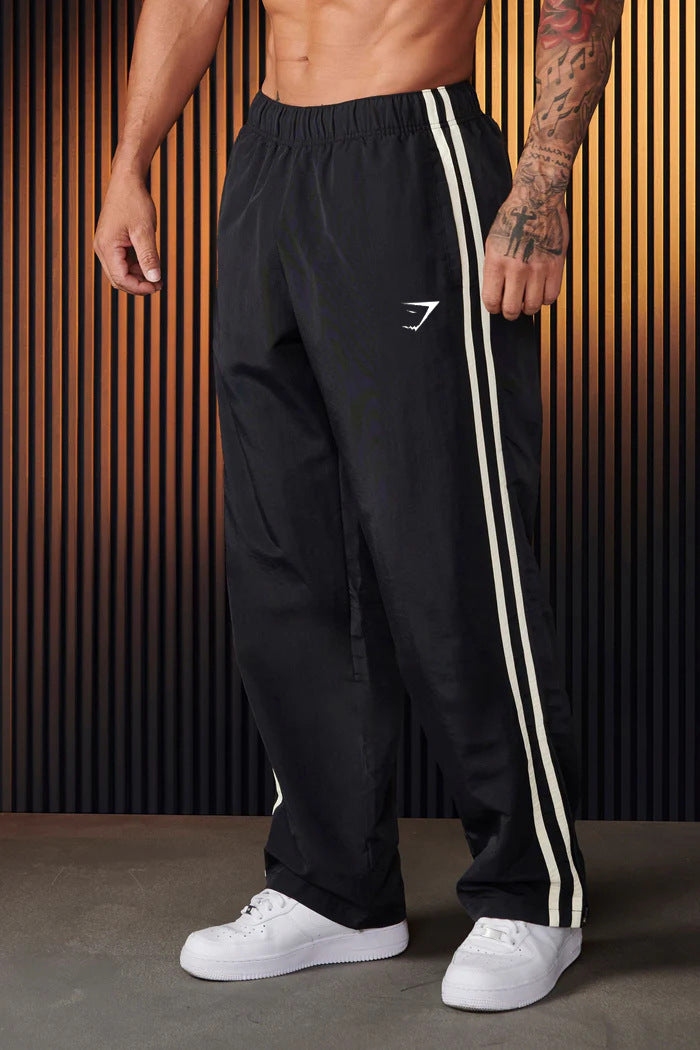 Gymshark Black Track Pants with White Side Stripes