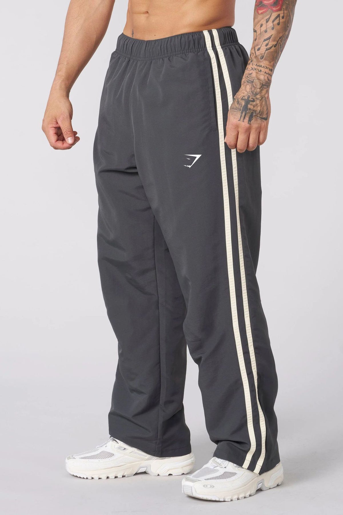 Gymshark Charcoal Grey Track Pants with Cream Side Stripes