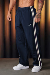 Gymshark Navy Track Pants with White Side Stripes