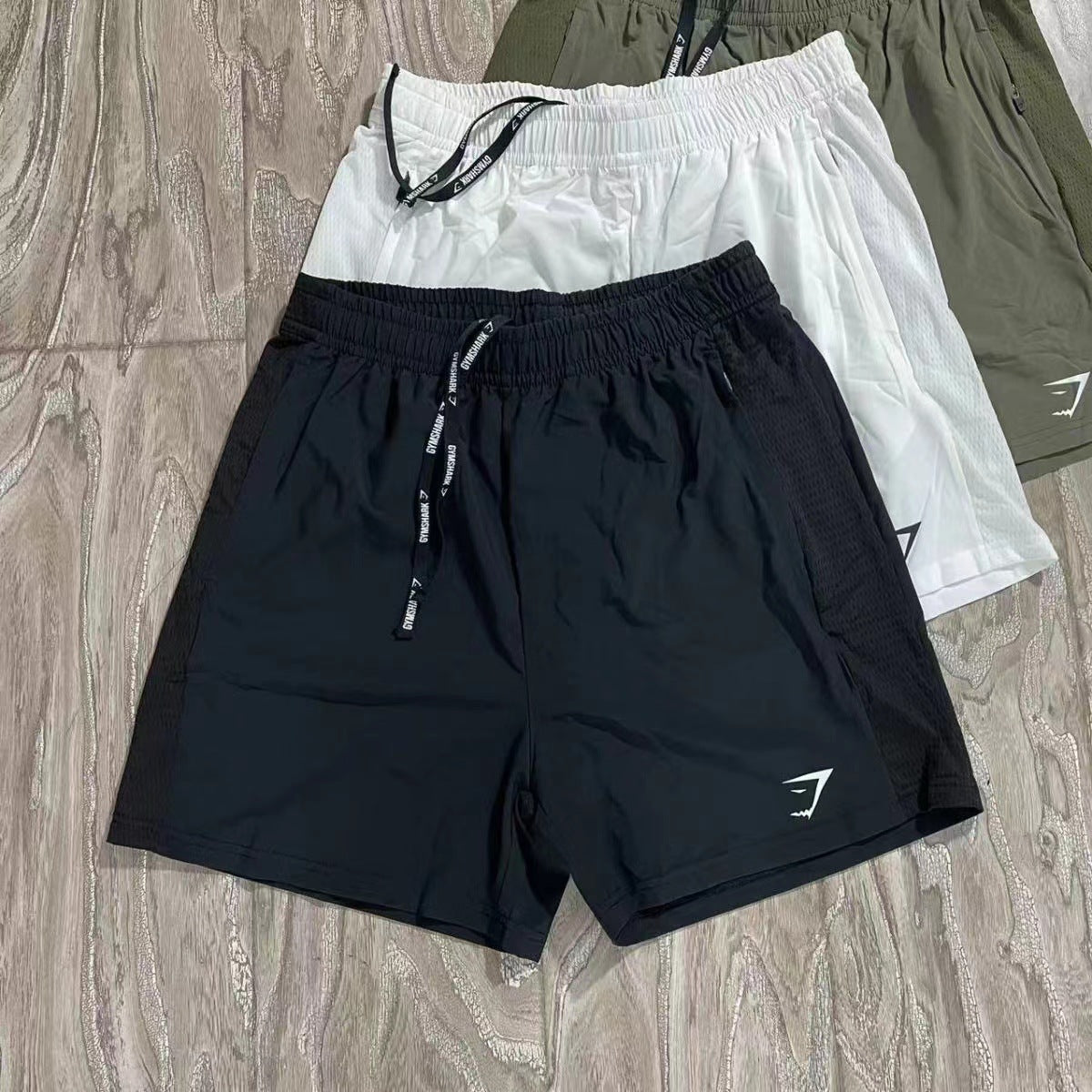 Original packaging Gymshark quick drying zipper shorts with patchwork design for breathable sports and fitness training for men's running