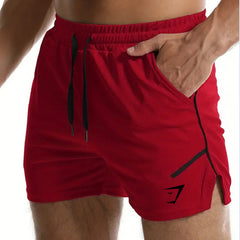 Gymshark Red Tech Training Shorts with Black Logo