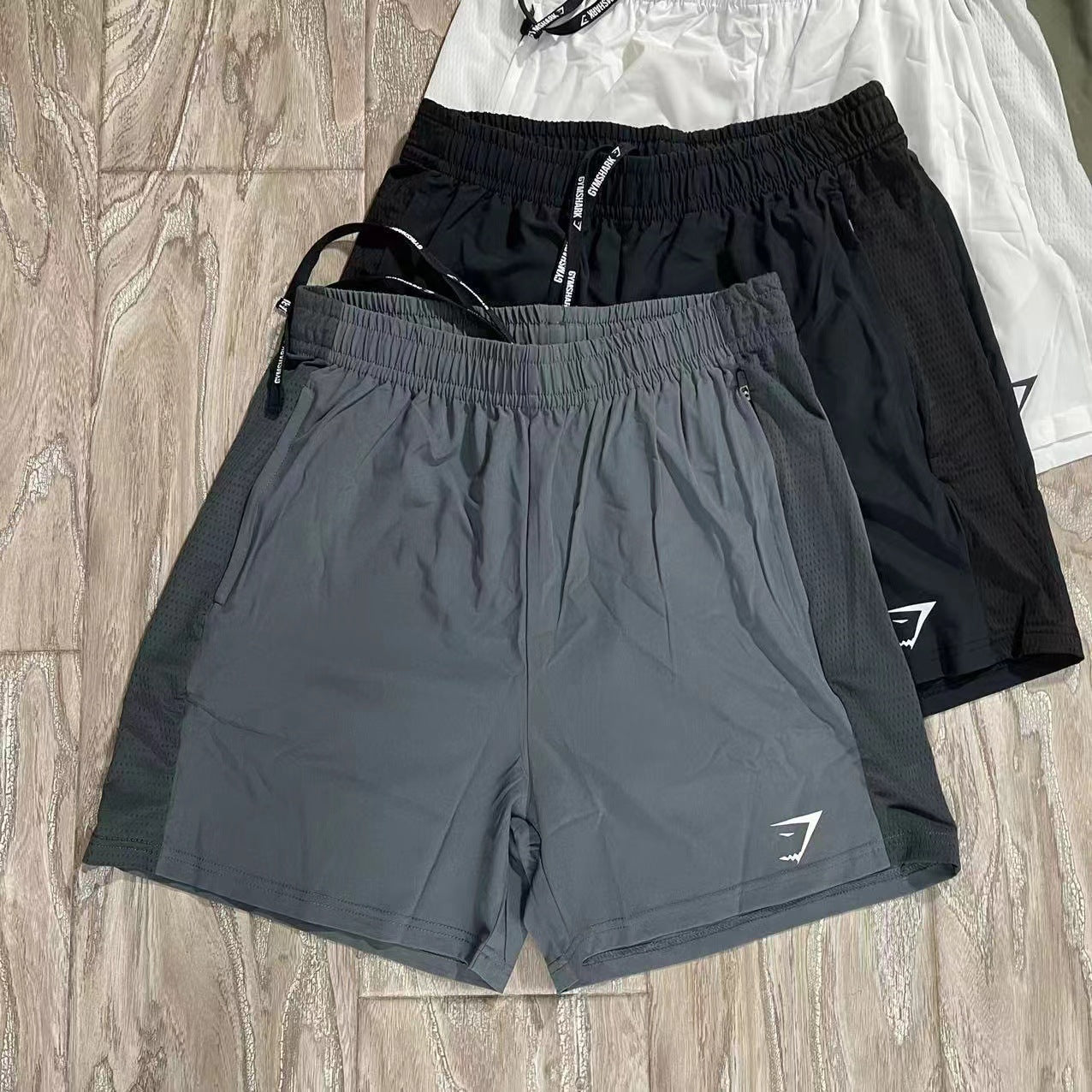 Original packaging Gymshark quick drying zipper shorts with patchwork design for breathable sports and fitness training for men's running