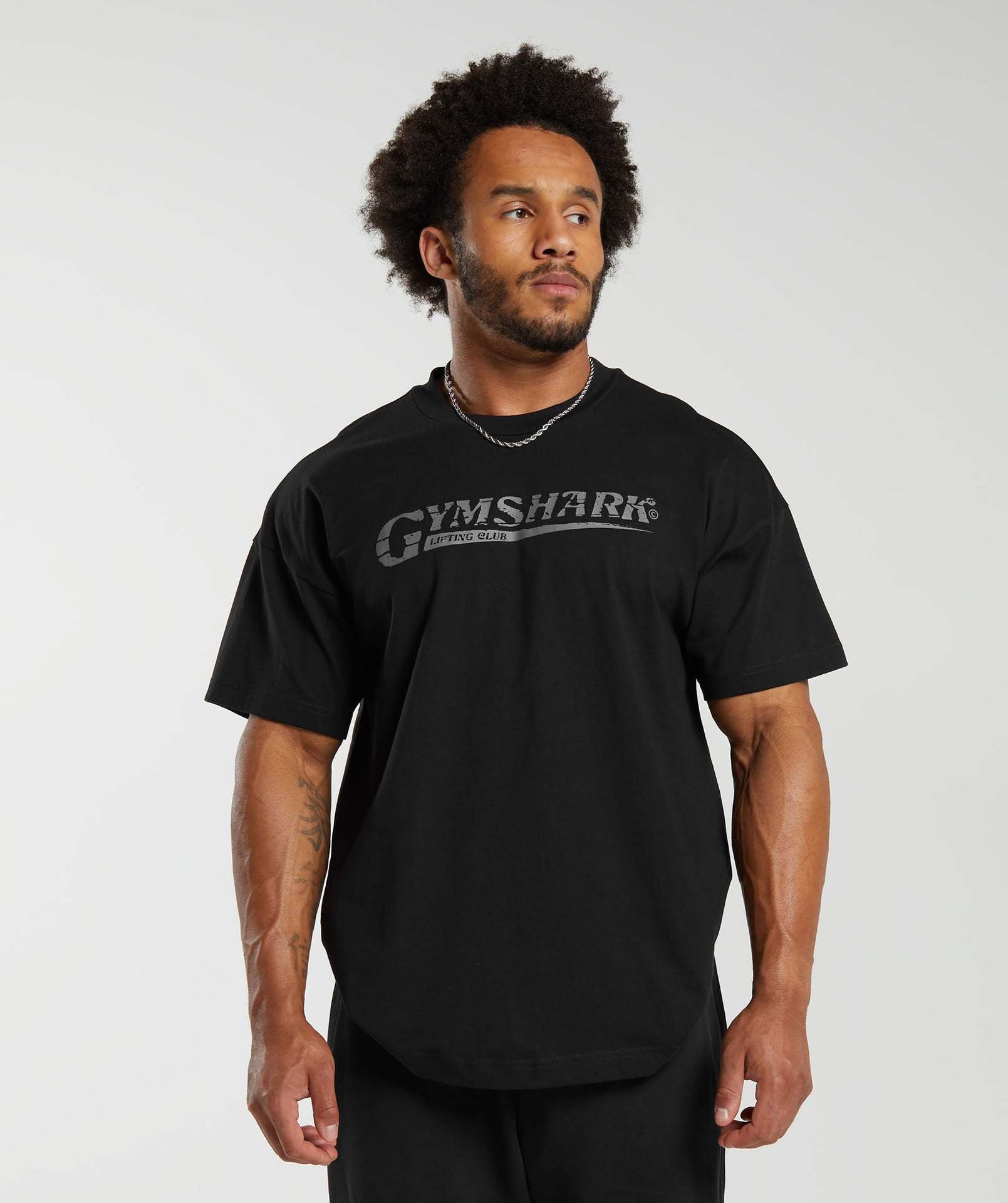 Cross border hot selling muscle shark fitness trend loose oversized elastic breathable printed men's and women's short sleeved T-shirt